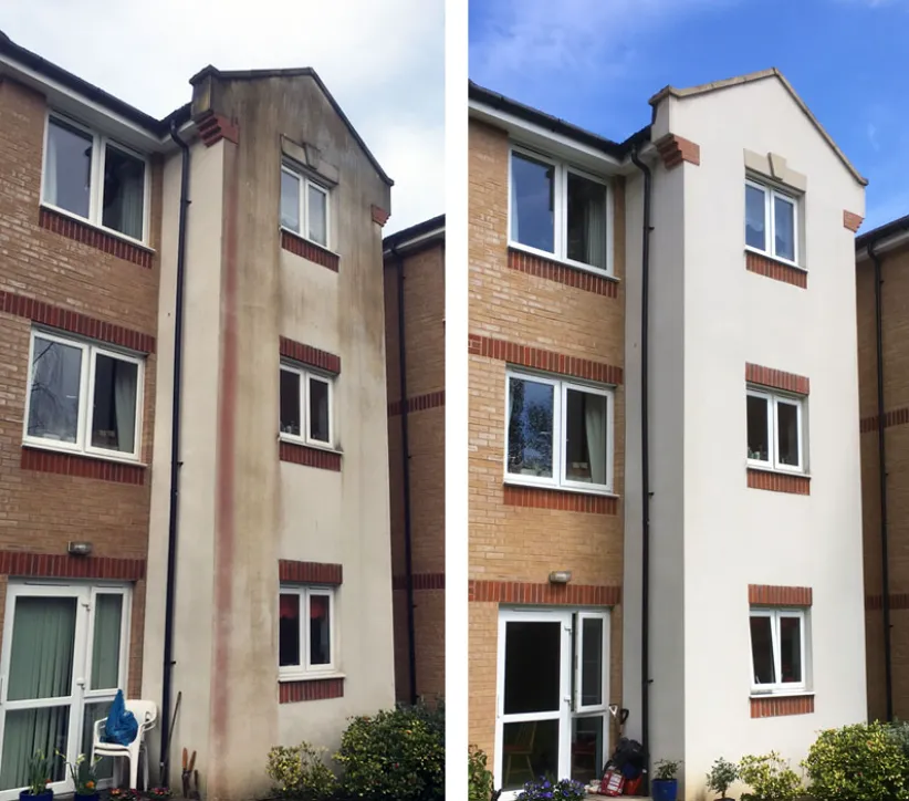 Before and after of an apartment building exterior soft-washed by Property Power Wash